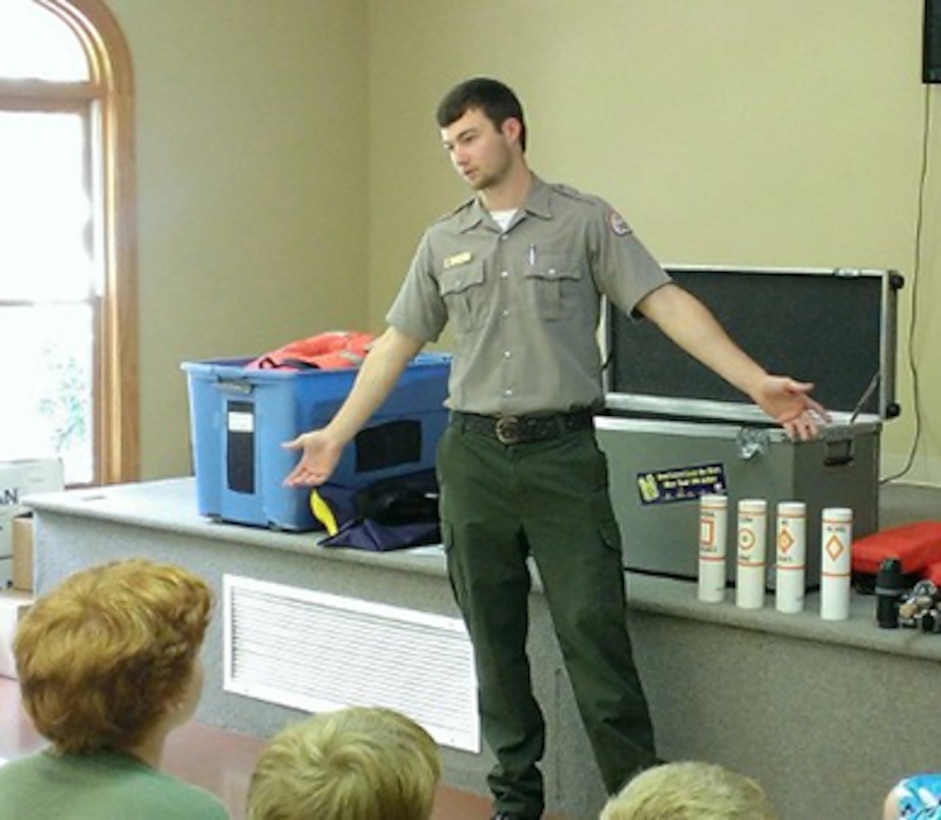 Center Hill Lake's Summer Ranger Dylan Hamlet talks with kids at Lighthouse Christian Camp July 7, 2015.  He visited the camp in Smithville, Tenn., each week and educated hundreds of campers on the importance of water safety.