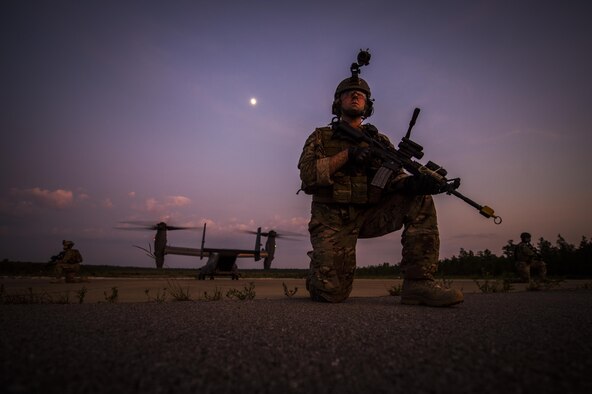 Senior Airman Daniel Willens, 1st Special Operations Security Forces Squadron deployed aircraft ground response element team member, provides security during a task force exercise on Eglin Range Complex, Fla., July 27, 2015. Exercise scenarios included downed aircraft site security and armed escort. Through the scenarios, DAGRE was able to accomplish multiple training objectives including close quarters combat, small unit tactics, flight deck denial, fly away security, close air support, casualty evacuation and more. (U.S. Air Force photo by Senior Airman Christopher Callaway)