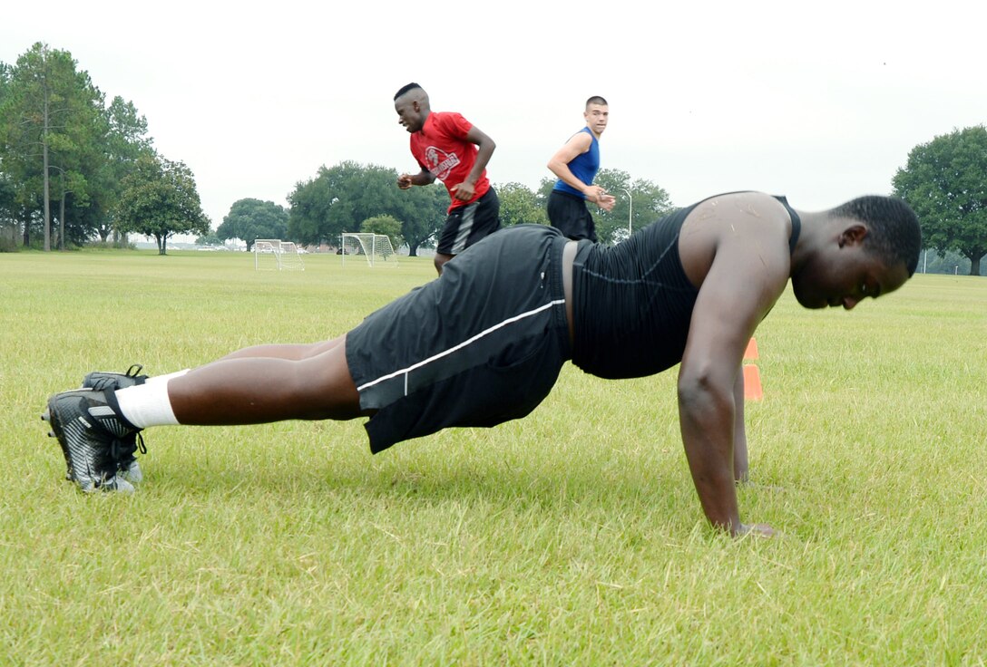 Members of the Sherwood Christian Academy, Albany, Ga., football team participate in  High Intensity Tactical Training at Marine Corps Logistics Base Albany during a weeklong football camp, recently.