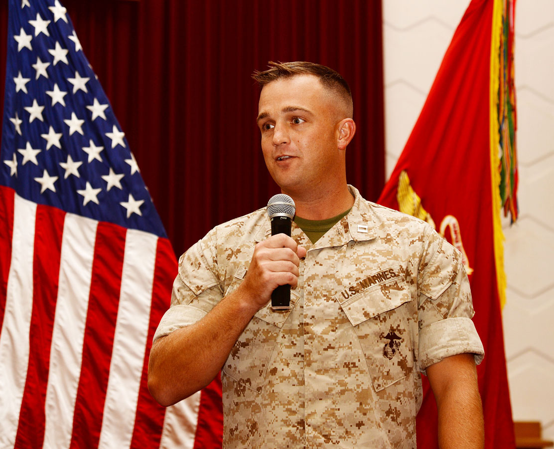 Capt. George McDonnell, deputy staff judge advocate and former company commander of Marine Corps Logistics Base Albany’s Headquarters and Support Company, thanks his Marines and his family for their support during his tenure as company commander. Capt. Cesar Gilcardona, logistics officer, took over as the new company commander during a ceremony at the installation’s Chapel of the Good Shepherd, Aug. 6. McDonnell handed Gilcardona the company’s colors signifying the change of command. Col. James C. Carroll III, commanding officer, MCLB Albany, welcomed Gilcardona to his new position and praised McDonnell’s achievements during his tenure as company commander.
