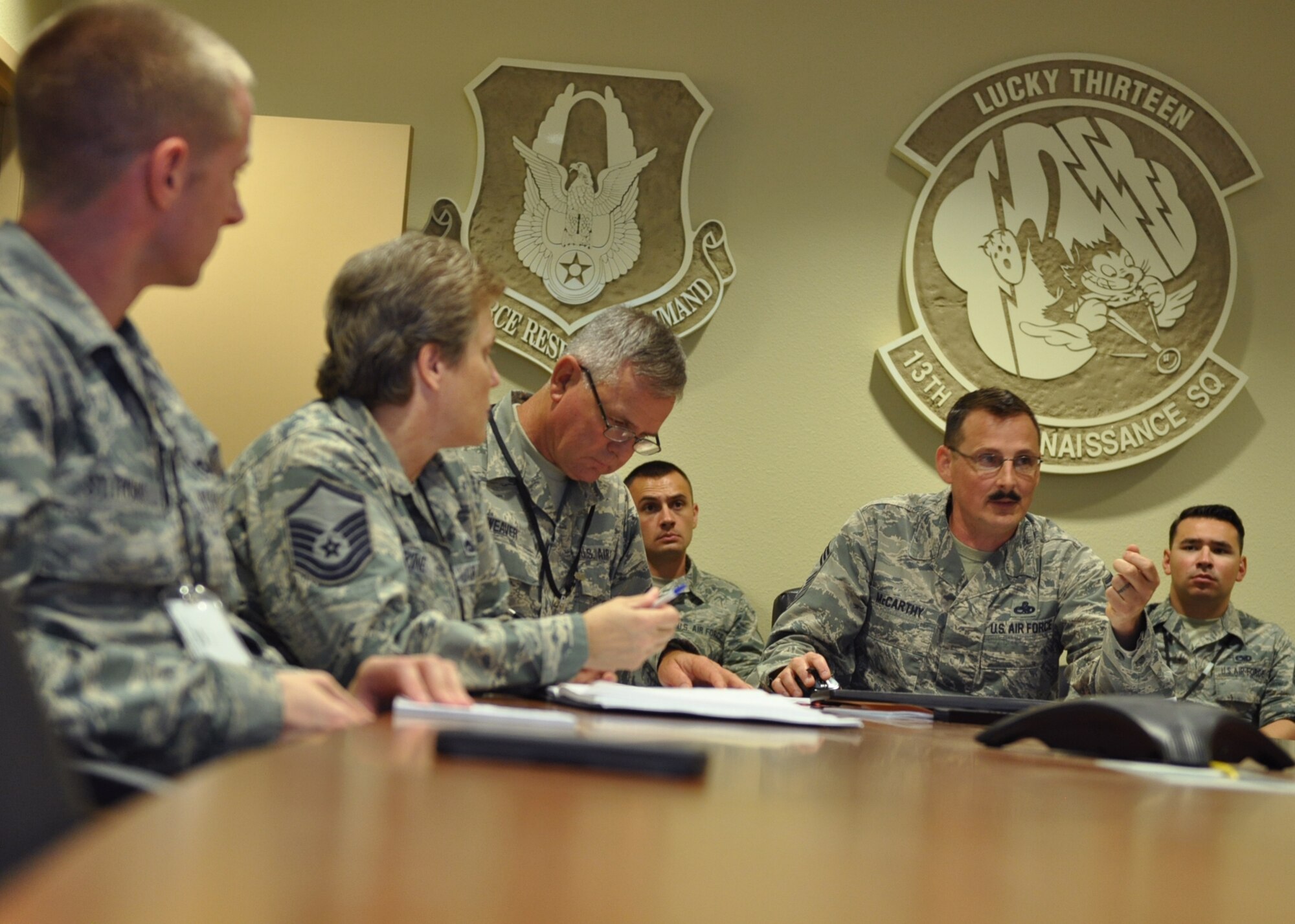 Chief Master Sgt.’s Daniel McCarthy and Michael Weaver, both 349th Air Mobility Wing Detachment 1 flight chiefs, host a development workshop on the newly ushered in Airman Comprehensive Assessment form, Beale Air Force Base, Calif., Aug. 2, 2015. The session provided tips on how to be a better supervisor, offer constructive criticism, how to properly fill out the form and much more. This is the second development workshop they’ve offered during the monthly unit training assemblies here. For their next lesson in September, they plan to offer techniques for improving wing members’ communication skills.