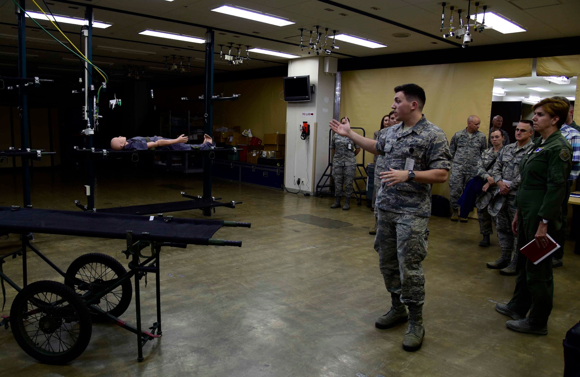 U.S. Air Force Airman 1st Class Joshua Owens, 35th Medical Operations Squadron aerospace medical technician, briefs Gen. Lori Robinson, Pacific Air Forces commander, during a visit to the 35th Medical Group at Misawa Air Base, Japan, Aug. 5, 2015. Owens discussed the expansion of Misawa’s medical bay, which is designed to support injured military members in case of emergencies. (U.S. Air Force photo by Airman 1st Class Jordyn Fetter/Released)


