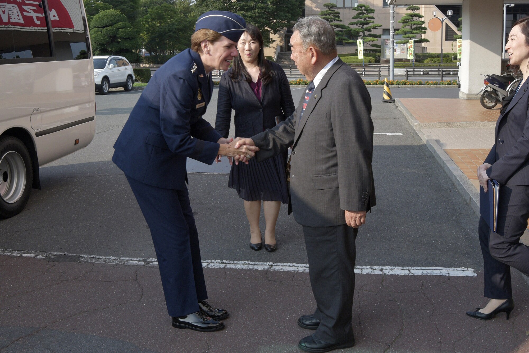 U.S. Air Force Gen. Lori Robinson, Pacific Air Forces commander, meets with Kazumasa Taneichi, Misawa City mayor, in Misawa, Japan, Aug. 4, 2015. As part of the PACAF commander's first visit to Misawa Air Base, she met with local community leadership to express her gratitude on their commitment to supporting Misawa Air Base’s mission. (U.S. Air Force photo by Senior Airman Jose L. Hernandez/Released)

