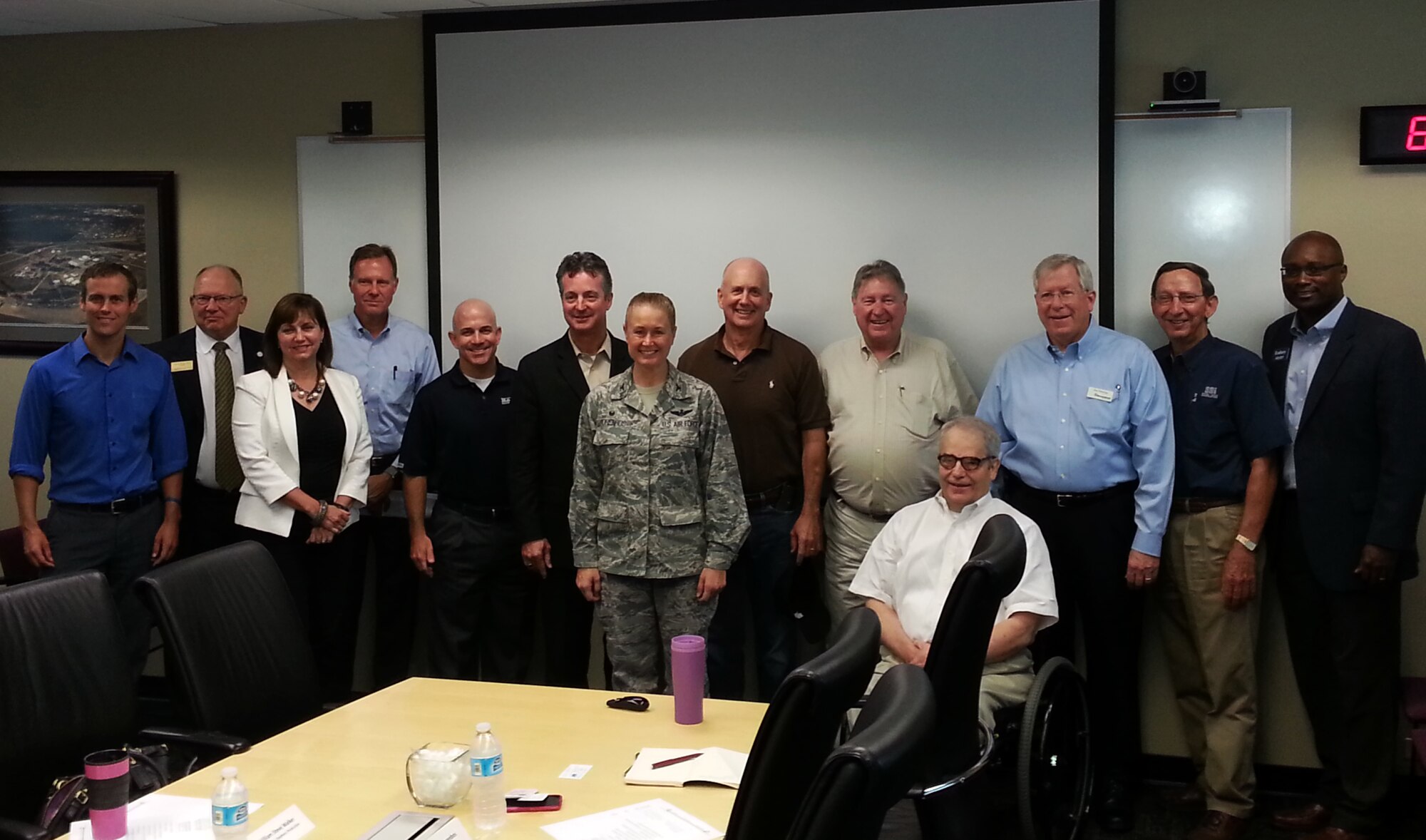 Members of the Fort Smith Regional Council pose for a photo with Col. Bobbi Doorenbos, 188th Wing commander, at Ebbing Air National Guard Base, Fort Smith, Ark., Aug. 6, 2015. Members of the 188th provided the FSRC with a mission briefing and an update on the wing’s on-going mission conversion, which is the most complex in unit history. The FSRC is a group of business leaders which “provides leadership in improving economic growth, prosperity, and the quality of life in our community.
The FSRC identifies, develops and supports projects and policies that will have significant long-term positive economic impact on the Fort Smith Region.” The primary objective of the meeting was to inform local business leaders what new skillsets are included in the 188th’s new intelligence, surveillance and reconnaissance, targeting and remotely piloted aircraft missions. The goal was to connect area businesses with 188th drill status members looking for full-time employment opportunities in the River Valley region in order to help retain members in the wing and to provide local businesses with highly trained employees who embrace the Air Force Core Values of integrity, service before self and excellence in all they do. (U.S. Air National Guard photo by Maj. Heath Allen/Released)