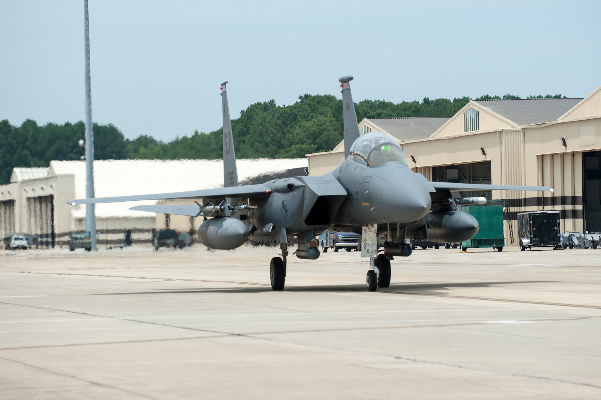 An F-15E Strike Eagle taxis back after a training flight, July 22, 2015, at Seymour Johnson Air Force Base, North Carolina. Lt. Col. Paul Hibbard, 333rd Fighter Squadron instructor pilot, flew his 3,000th hour during the flight, reaching a milestone few other fighter pilots meet during their careers. (U.S. Air Force photo/Airman Shawna L. Keyes)

