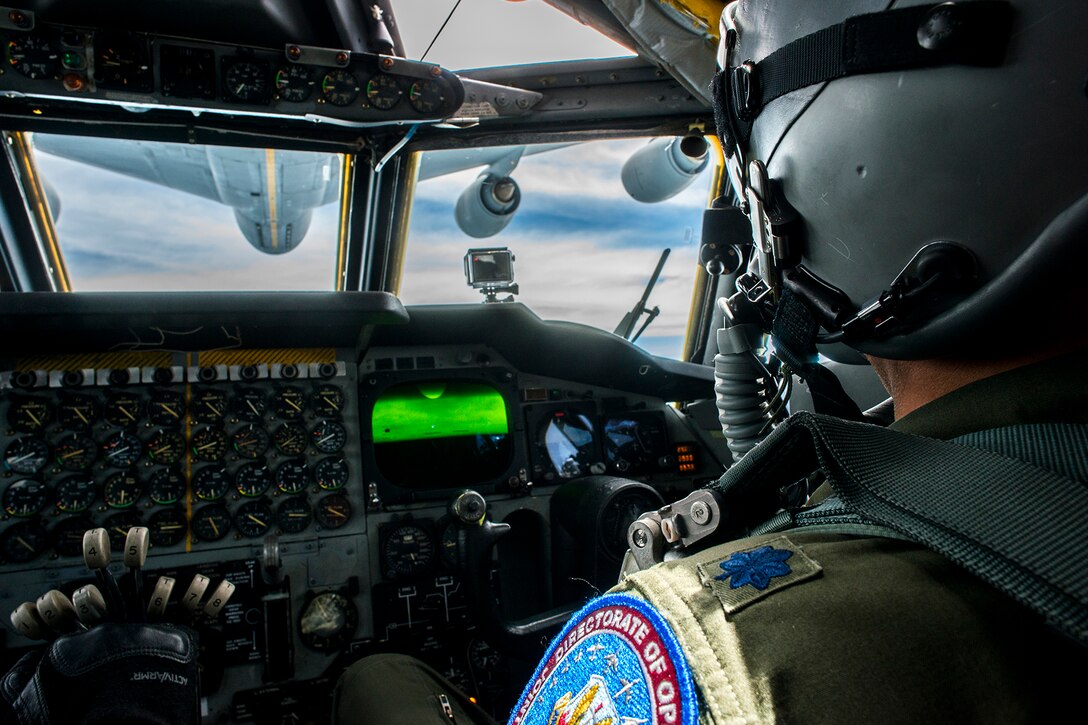 A B-52H Stratofortress copilot practices an aerial refueling with a KC-135 Stratotanker on July 10, Barksdale Air Force Base, La. The B-52 is assigned to the Air Force Reserve Command's 307th Bomb Wing, which hosts the only schoolhouse where Reserve and Active Duty aircrew learn to fly the B-52. (U.S. Air Force photo by Master Sgt. Greg Steele/Released)