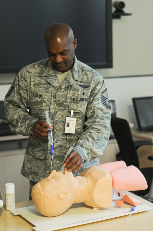 A picture of U.S. Air Force Master Sgt. Ronald Paulin, an aerospace medical technician with the New Jersey Air National Guard's 177th Medical Group, conducting ambulance service training.