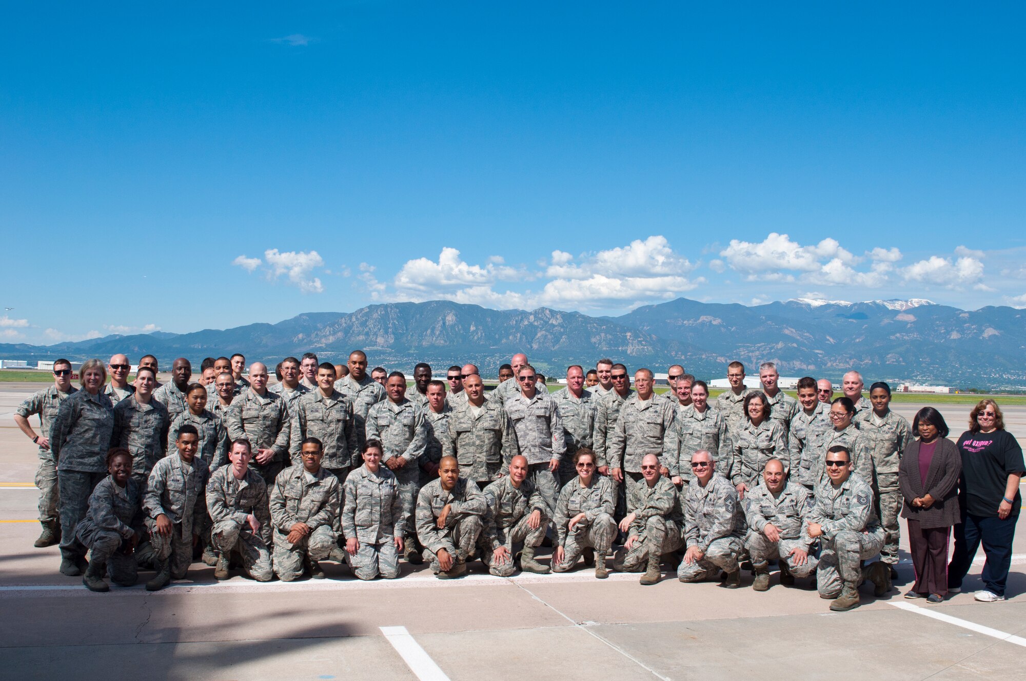 Reserve Airmen pose for a photo on the flightline at Peterson Air Force Base, Colo. The Airmen, most of whom were from the 514th Aircraft Maintenance Group, were in Colorado as part of a training event in mid-June. (U.S. Air Force photo by Capt. Allison Ecung)