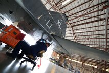 A 47th Flying Training Wing Maintenance Directorate maintainer works on a T-38 Talon on Laughlin Air Force Base, Texas, July 28, 2015. Laughlin’s maintenance directorate, also known as Laughlin Consolidated Services Aircraft Maintenance, is responsible for furnishing quality aircraft, support, and services. (U.S. Air Force photo by Airman 1st Class Ariel D. Partlow)(Released) 