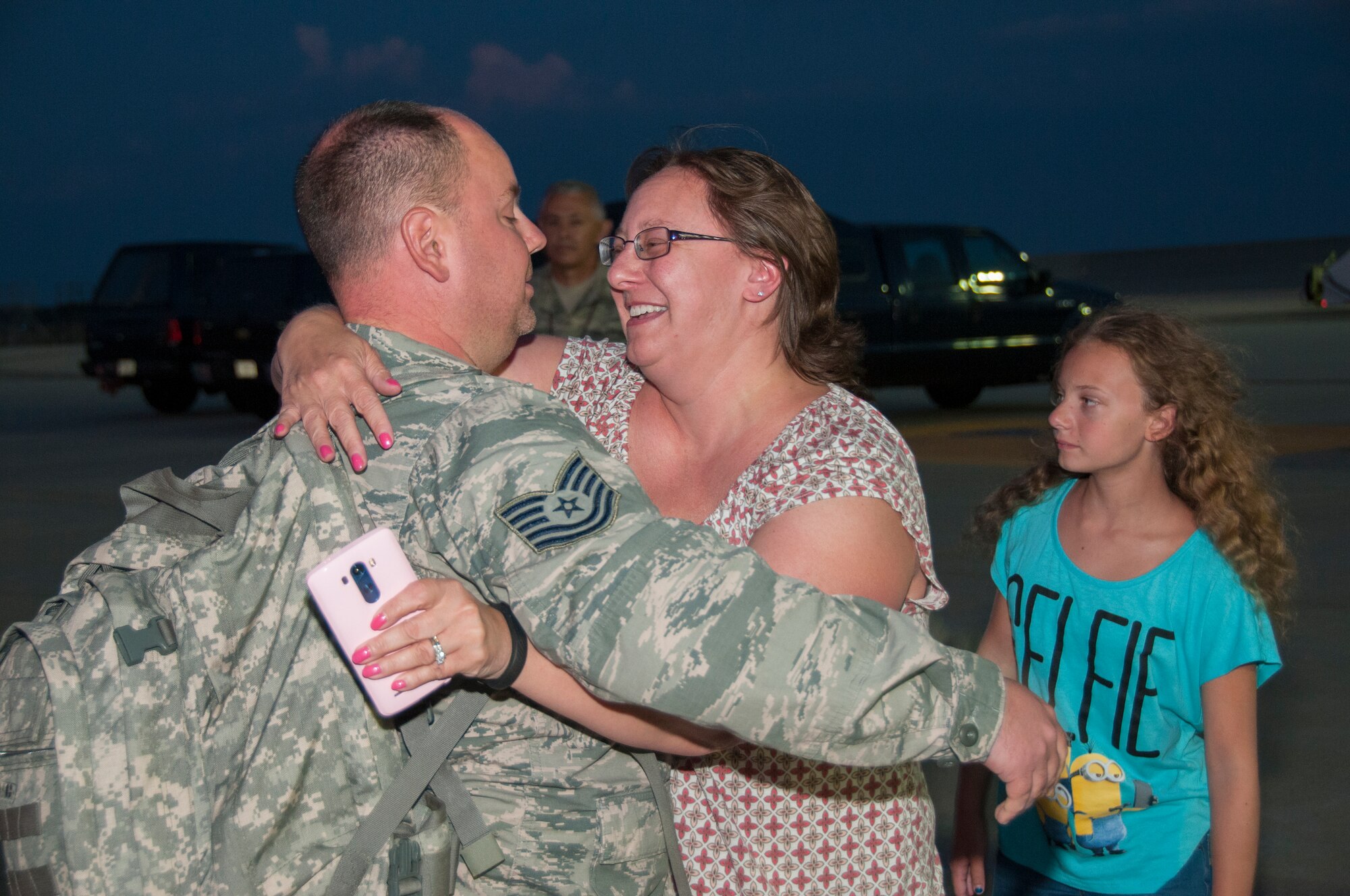 Tech. Sgt. Robert Jentsch, Avionics Technician with the 108th Maintenance Squadron returns from his 6th deployment and is embraced by his wife Becky at Joint Base McGuire-Dix-Lakehurst, N.J., August 5, 2015. More than 30 Airmen from the 108th Wing, New Jersey Air National Guard, returned home from a two-month deployment in support of Operations Freedom's Sentinel and Enduring Freedom in the Central Command area of operations. The Airmen were greeted by Brig. Gen. Michael L. Cunniff, the Adjutant General of New Jersey and Col. Robert A. Meyer Jr., Commander, 108th Wing and a group of more than 50 friends, family and Guard members. (U.S. Air National Guard photo by Master Sgt. Carl Clegg/Released)