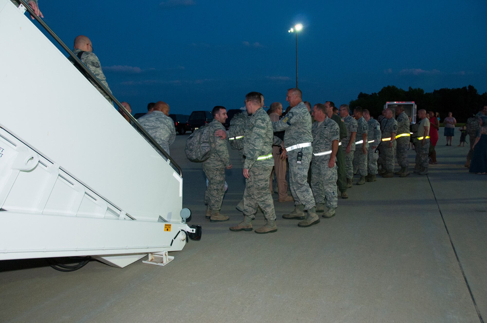 More than 30 Airmen from the 108th Wing, New Jersey Air National Guard, returned home from a two-month deployment in support of Operations Freedom's Sentinel and Enduring Freedom in the Central Command area of operations at Joint Base McGuire-Dix-Lakehurst, N.J., August 5, 2015. The Airmen were greeted by Brig. Gen. Michael L. Cunniff, the Adjutant General of New Jersey and Col. Robert A. Meyer Jr., Commander, 108th Wing and a group of more than 50 friends, family and Guard members. (U.S. Air National Guard photo by Master Sgt. Carl Clegg/Released)