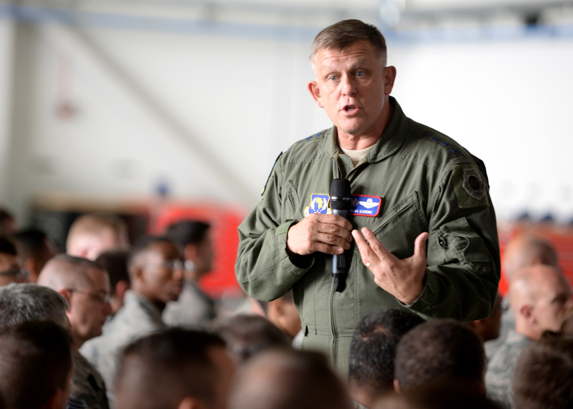 U.S. Air Force Gen. Frank Gorenc, center, U.S. Air Forces in Europe and Air Forces Africa commander, speaks during a all call held with Team Mildenhall members Aug. 5, 2015, on RAF Mildenhall, England. Gorenc and U.S. Air Force Chief Master Sgt. James Davis, USAFE-AFAFRICA command chief, toured several facilities and met a variety of Airmen to learn more about the base’s overall mission. (U.S. Air Force photo by Tech. Sgt. Austin May/Released)