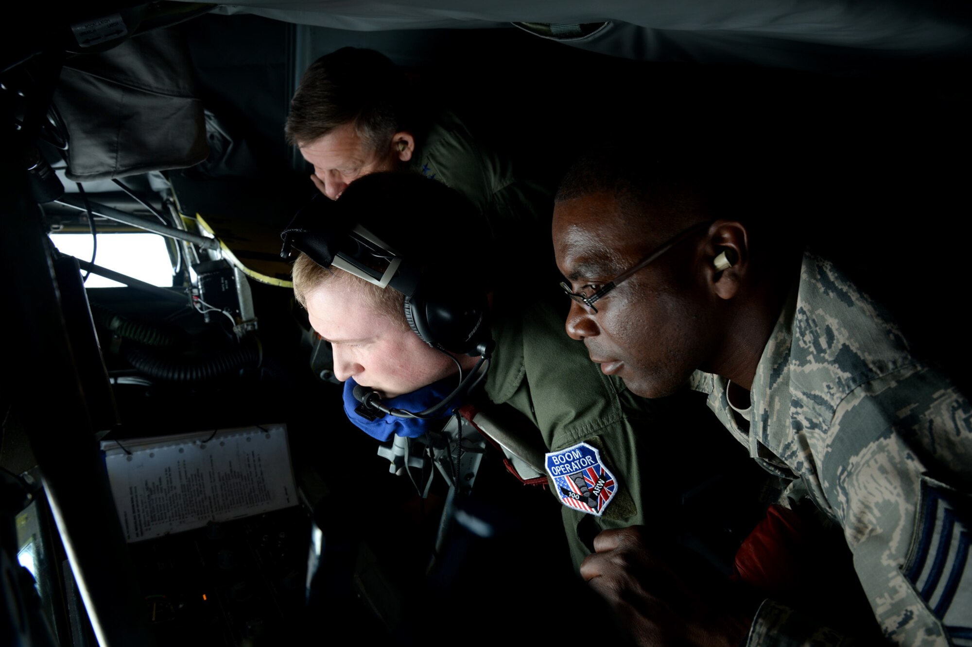 U.S. Air Force Gen. Frank Gorenc, back, U.S. Air Forces in Europe and Air Forces in Africa commander, and U.S. Air Force Chief Master Sgt. James Davis, right, USAFE-AFAFRICA command chief, observe as U.S Air Force Airman 1st Class Joseph Wukasch, 351st Air Refueling Squadron boom operator from Austin, Texas, refuels an F-15 Eagle Aug. 5, 2015, over Norfolk, England. Gorenc and Davis visited several facilities and a variety of Airmen for a better understanding of Team Mildenhall and its mission. The two leaders also participated in a refueling flight and held an all-call to strengthen the relationship between RAF Mildenhall and its major command. (U.S. Air Force photo by Senior Airman Kate Thornton/Released)