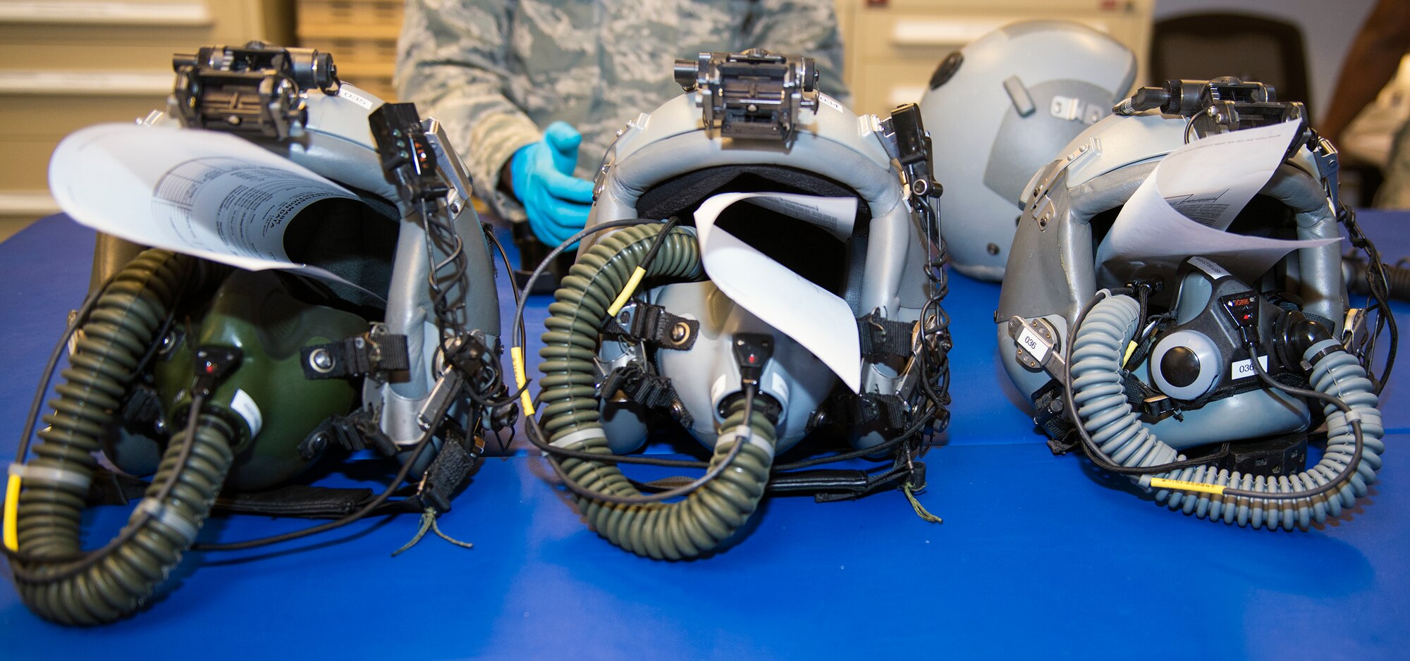 HGU-55/P helmets rest after passing inspection Aug. 5, 2015, at Moody Air Force Base, Ga. The 347th Operations Support Squadron aircrew flight equipment assigned to the 71st Rescue Squadron inspects an average of 40 helmets a week for the 71st RSQ HC-130P/J aircrew members. (U.S. Air Force photo by Airman Greg Nash/Released) 