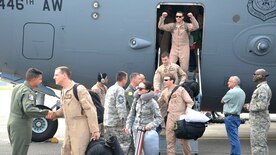 Wing leadership greets members of the 14th AS returning from their deployment to South West Asia.