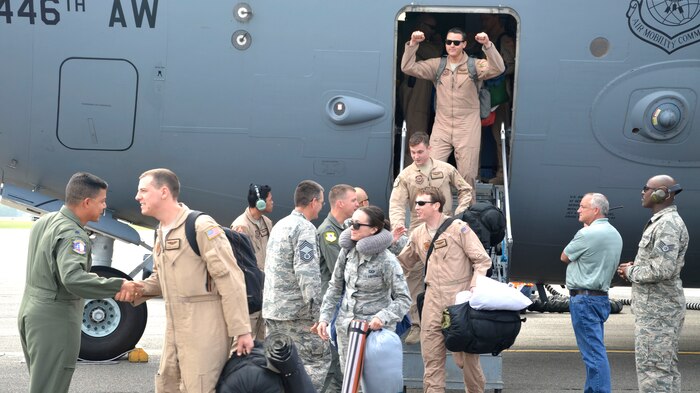 Wing leadership greets members of the 14th AS returning from their deployment to South West Asia.