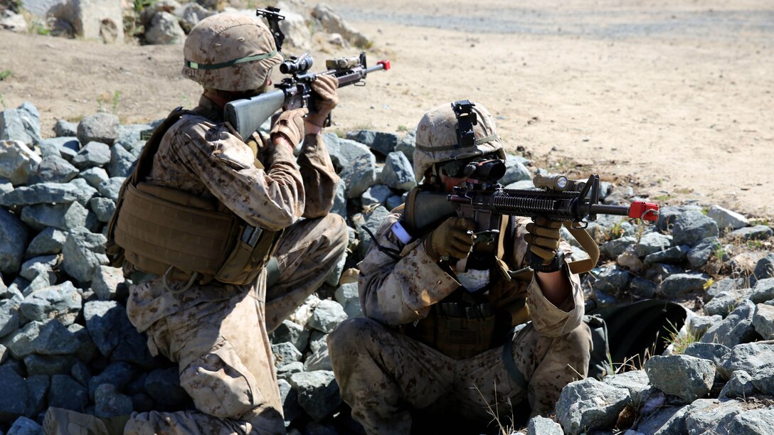Marines with 3rd Battalion, 5th Marine Regiment, 1st Marine Division, establish security during a helicopter raid, as part of the Marine Corps Combat Readiness Evaluation (MCCRE), aboard Marine Corps Base Camp Pendleton, Calif., Aug. 4, 2015. The MCCRE is used evaluate the operational readiness of a designated unit. 