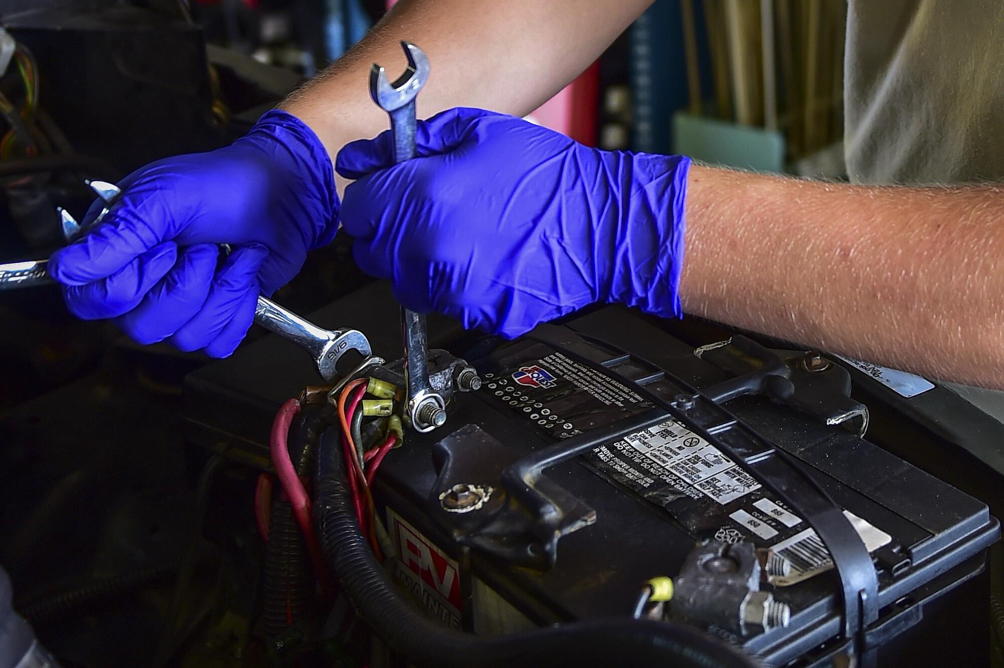 Airman Kyle Daly, 1st Special Operations Logistics Readiness Squadron vehicle mechanic apprentice, secures the connections on a battery during a routine battery replacement on Hurlburt Field, Fla., Aug. 3, 2015. The vehicle maintenance flight is responsible for keeping the base’s vehicle fleet in-service at all times for use during training and flight line maintenance operations. (U.S. Air Force photo/Senior Airman Jeff Parkinson)