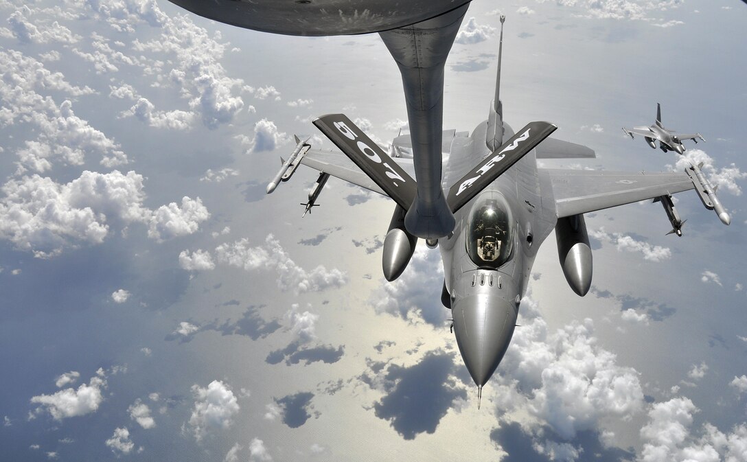 An F-16 Fighting Falcon assigned to the 93rd Fighter Squadron, Homestead Air Reserve Base, Fla., prepares to be refueled over the Gulf of Mexico by a KC-135 Stratotanker assigned to the 507th Air Refueling Wing from Tinker Air Force Base, Okla., as part of an Employer Support of the Guard and Reserve Bosslift event hosted by the 482nd Fighter Wing at Homestead ARB July 2015. (U.S. Air Force photo/Maj.
Eugenia Ramirez-Griffin)
