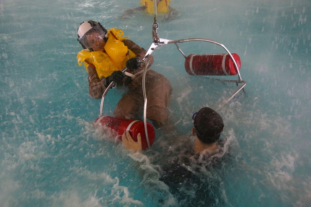 Marines participated in water survival training at Marine Corps Air Station Cherry Point, North Carolina, July 28, 2015. The Aviation Survival Training Center is the only water survival facility on any Marine Corps installation on the East Coast. Naval aviators are given classes on protocol and the gear they use in case of an emergency on an aircraft. The skills they learn in ASTC ensure 2nd Marine Aircraft Wing, its aviators and crew members are qualified and maintain the highest state of readiness.