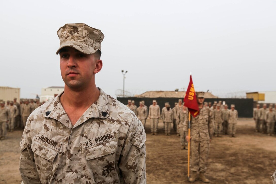 CAMP LEMONNIER, Djibouti (Aug. 2, 2015) U.S. Marine Sgt. Ryan Jackson stands in front of a formation during his promotion ceremony. Jackson is a squad leader with India Company, Battalion Landing Team 3rd Battalion, 1st Marine Regiment, 15th Marine Expeditionary Unit and was meritoriously promoted to corporal this month. Elements of the 15th MEU are ashore in Djibouti for sustainment training to maintain and enhance the skills they developed during their pre-deployment training period.  The 15th MEU is currently deployed in support of maritime security operations and theater security cooperation efforts in the U.S. 5th Fleet area of operations. (U.S. Marine Corps photo by Sgt. Jamean Berry/Released)