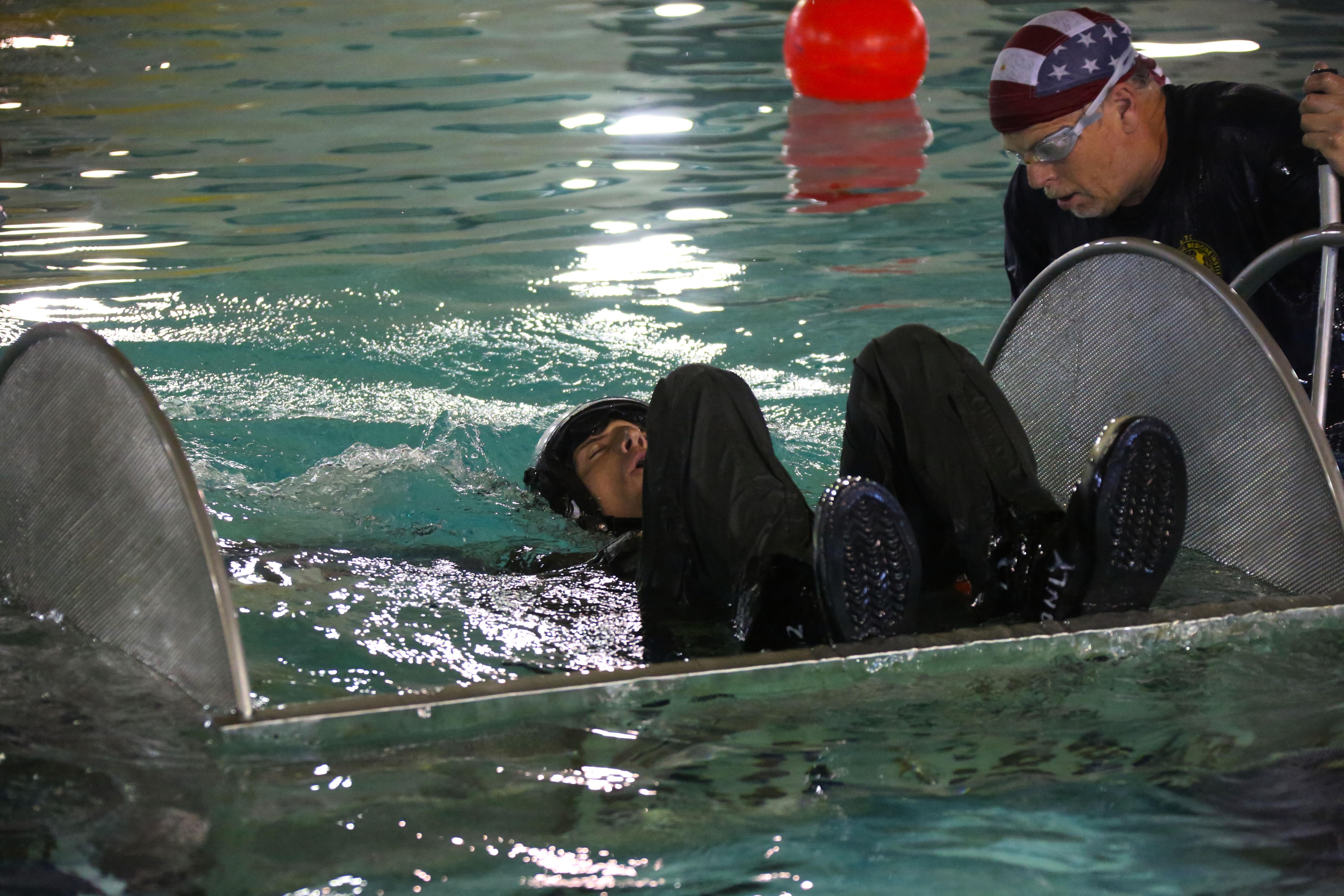 Marines conduct life saving water survival training