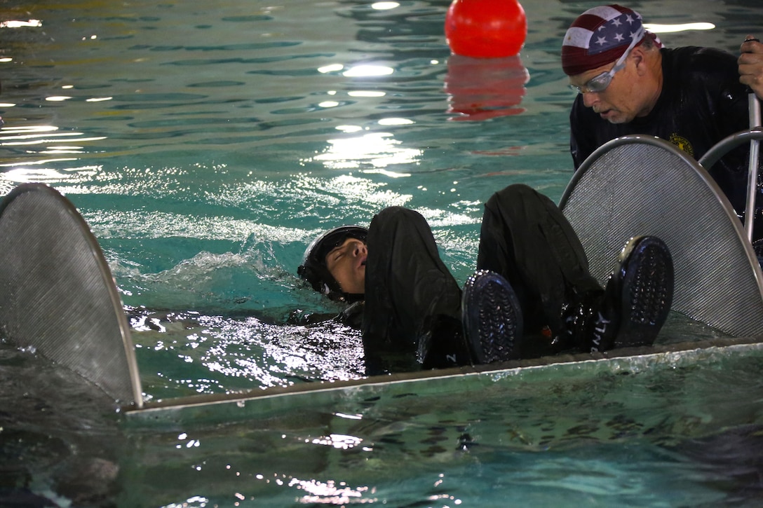 Capt. Colin Marty participated in water survival training at Marine Corps Air Station Cherry Point, North Carolina, July 28, 2015. The Aviation Survival Training Center is the only water survival facility on any Marine Corps installation on the East Coast. Naval aviators are given classes on protocol and the gear they use in case of an emergency on an aircraft. The skills they learn in ASTC ensure 2nd Marine Aircraft Wing, its aviators and crew members are qualified and maintain the highest state of readiness.