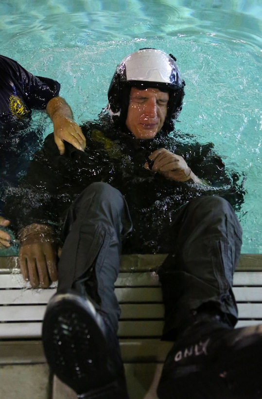 Capt. Colin Marty participates in water survival training at Marine Corps Air Station Cherry Point, North Carolina, July 28, 2015. The Aviation Survival Training Center is the only water survival facility on any Marine Corps installation on the East Coast. Naval aviators are given classes on protocol and the gear they use in case of an emergency on an aircraft. The skills they learn in ASTC ensure 2nd Marine Aircraft Wing, its aviators and crew members are qualified and maintain the highest state of readiness.