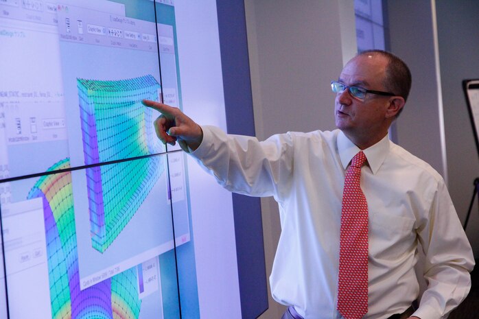 Dr. Mikel Petty, an instructor with the University of Alabama in Huntsville, shows measurements made during a modeling and simulation test during a certification course held in July at Marine Corps Base Quantico, Virginia. 