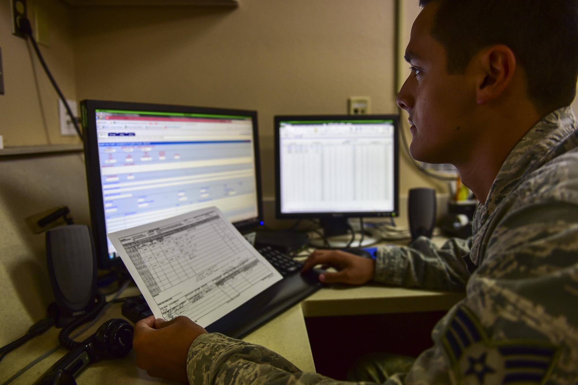 Senior Airman David Rios, 1st Special Operations Support Squadron airfield management operations shift leader, enters a flight plan into the aeronautical informations system replacement on Hurlburt Field, Fla., Aug 4, 2015. The AISR notifies other bases and airports of the aircraft flying. It provides information such as, aircraft type, tail number, and departure and arrival times so aircraft can be tracked by other air traffic control towers to ensure safe travel through airways. (U.S. Air Force photo/Senior Airman Jeff Parkinson)