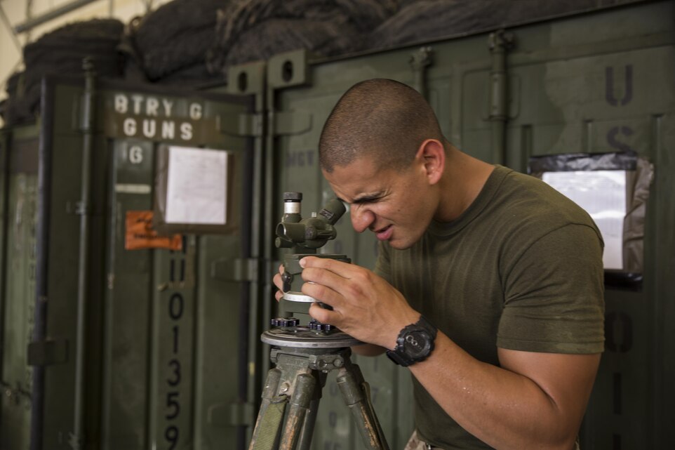A Marine with 2nd Battalion, 10th Marine Regiment participating in Reconnaissance Selection Occupation and Position training, uses an aiming circle during a section chief’s course aboard Camp Lejeune, N.C., Aug. 6, 2015. The aiming circles orient the mortar, making sure the mortar will accurately provide supporting fire. The Marines undergoing section chief’s course will potentially be in charge of a team of five Marines and an artillery weapon system once returning to the unit. (U.S. Marine Corps photo by Lance Cpl. Chris Garcia/Released)