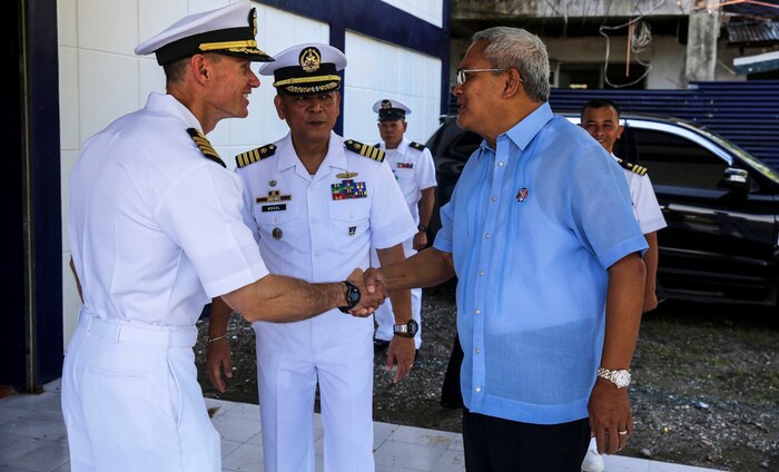 SAN FERNANDO CITY, Philippines (August 6, 2015) - Commodore, Task Force Forager, Capt. James Meyer, shakes hands with the Vice Governor of San Fernando City, Aureo Nisce, during an opening ceremony. Task Force Forager will be in the Philippines until August 15 providing medical and engineering assistance. Task Force Forager, embarked aboard the Military Sealift Command joint high speed vessel USNS Millinocket (JHSV 3) is serving as the secondary platform for Pacific Partnership, led by an expeditionary command element from the Navy’s 30th Naval Construction Regiment (30 NCR) from Port Hueneme, Calif. Now in its 10th iteration, Pacific Partnership is the largest annual multilateral humanitarian assistance and disaster relief preparedness mission conducted in the Indo-Asia Pacific region. 