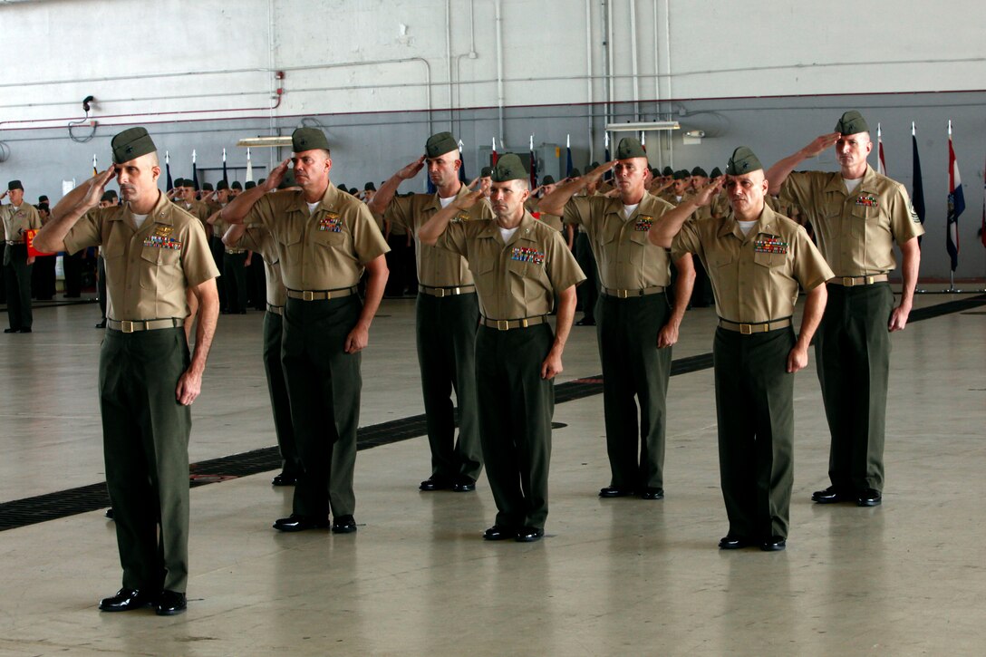 Marines salute Maj. Gen. Gary L. Thomas, the commanding general of 2nd Marine Aircraft Wing, during an assumption of command ceremony at Marine Corps Air Station Cherry Point, North Carolina, Aug. 7, 2015.