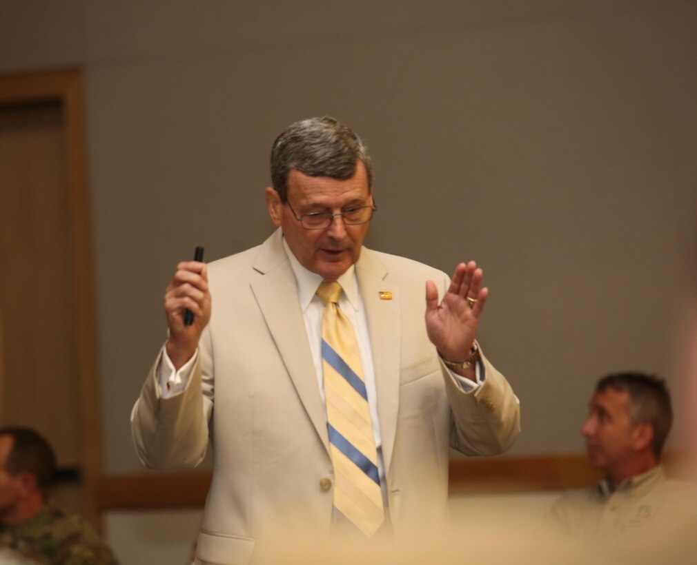 NEW ORLEANS – Terry Ebbert, former director of Homeland Security for the city of New Orleans, explains the logistical issues New Orleans faced during Hurricane Katrina to senior military and civilian leaders during a Defense Support of Civil Authorities seminar at the Federal City auditorium Aug. 5, 2015. During his brief, Ebbert shared personal stories and accounts he experienced before, during and after the storm. (U.S. Marine Corps Photo by Cpl. J. Gage Karwick/Released)