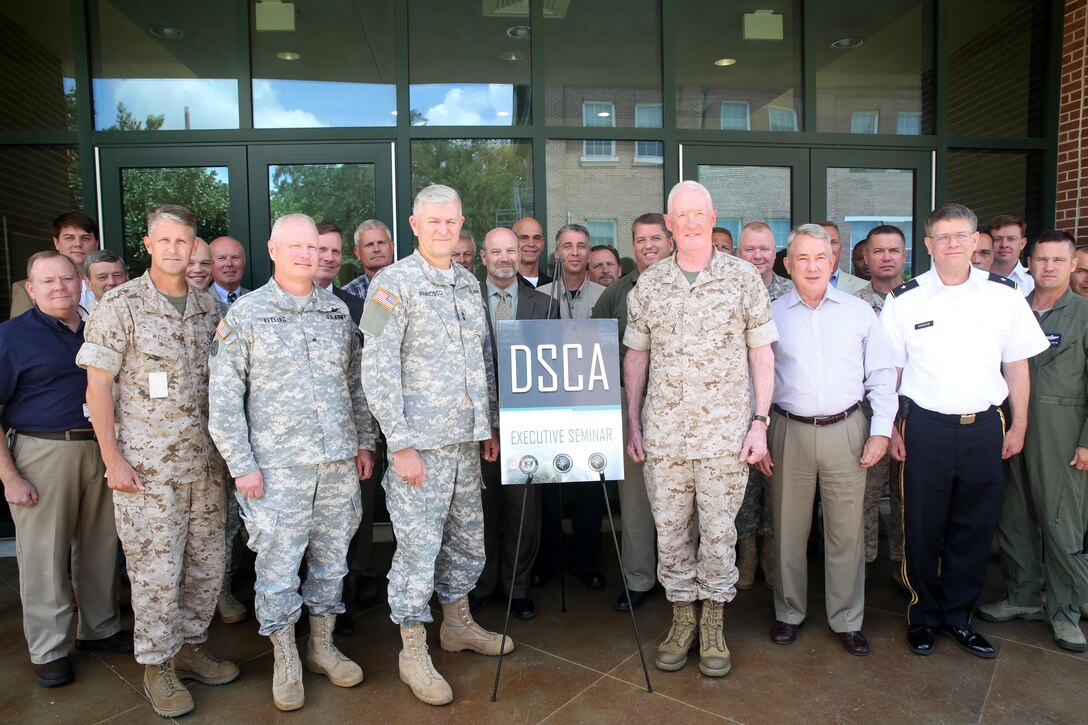 NEW ORLEANS –Senior military and civilian leaders attend a Defense Support of Civil Authorities seminar at the Federal City auditorium Aug. 5, 2015. The seminars focus on events that are likely to happen in the area they occur. With this seminar taking place in Louisiana, the attention focused on hurricane response and coordination, using Hurricane Katrina as a reference. (U.S. Marine Corps Photo by Cpl. J. Gage Karwick/Released)