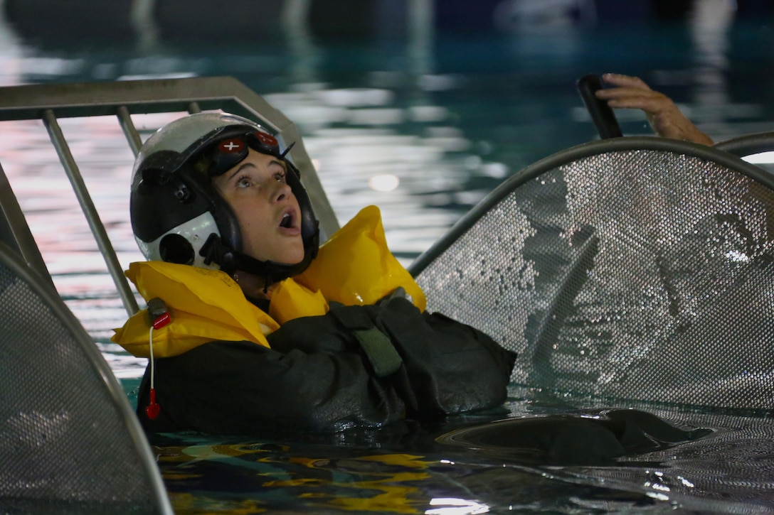 Sgt. Rachel Lablance participates in water survival training at Marine Corps Air Station Cherry Point, North Carolina, July 28, 2015. The Aviation Survival Training Center is the only water survival facility on any Marine Corps installation on the East Coast. Naval aviators are given classes on protocol and the gear they use in case of an emergency on an aircraft. The skills they learn in ASTC ensure 2nd Marine Aircraft Wing, its aviators and crew members are qualified and maintain the highest state of readiness. Lablance is an aircraft structures mechanic with Marine Transport Squadron 1.