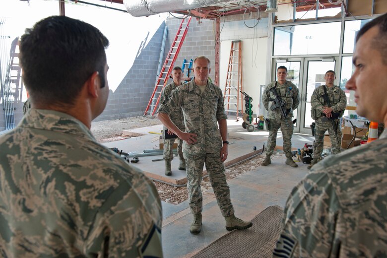 CHEYENNE MOUNTAIN AIR FORCE STATION, Colo. – Chief Master Sgt. of the Air Force James A. Cody talks with Airmen from the 721st Security Forces Squadron during his visit to Cheyenne Mountain Air Force Station, Aug. 6, 2015. Cody was at CMAFS to visit with Airmen and get his first tour of “America’s Fortress.” He also held an enlisted call to discuss the changes taking place throughout the Air Force and answer any questions. (U.S. Air Force photo by Airman 1st Class Rose Gudex)