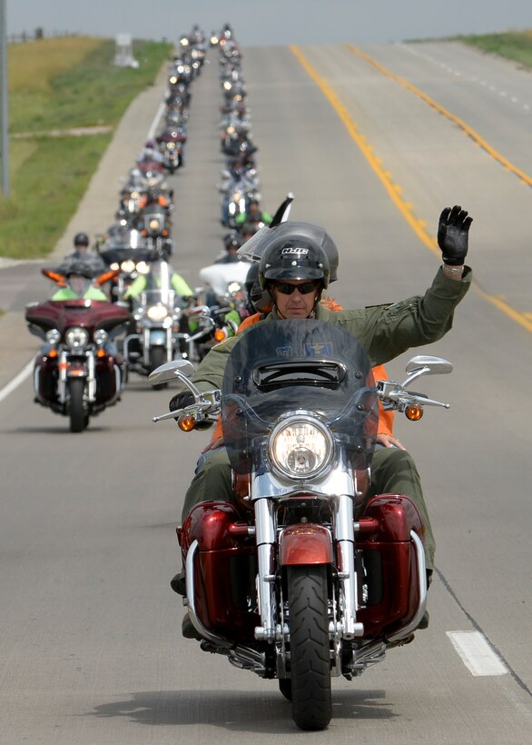 Col. Ty Neuman, 28th Bomb Wing vice commander, leads a pack of riders during the 2015 Dakota Thunder Motorcycle Run, Aug. 4, 2015. Participants traveled from Ellsworth Air Force Base to Sturgis, S.D., and then attended a military appreciation ceremony recognizing local veterans, an annual event to honor military members past and present. (U.S. Air Force photo by Senior Airman Anania Tekurio/Released)