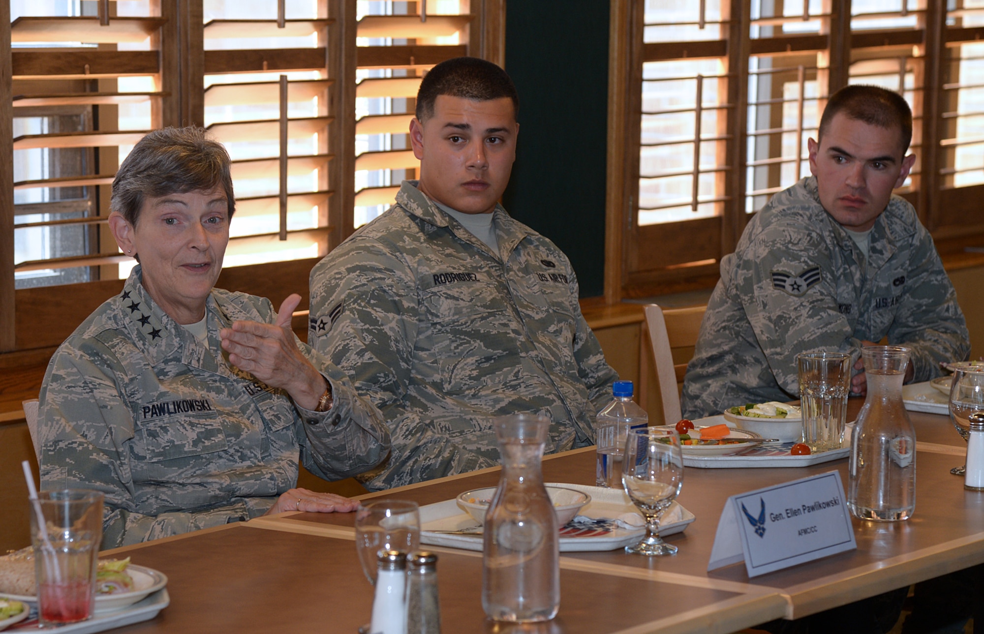 Gen. Ellen M. Pawlikowski, Air Force Materiel Command commander, talks with Team Hill Airmen during lunch at Hill Air Force Base, Utah, Aug. 6. During remarks after the meal, Pawlikowski emphasized the importance of resiliency and lauded Team Hill’s Total Force integration. She also answered Airmen’s questions and thanked them for their service and commitment. Also appearing in the photo are Airman 1st Class Steven Rodriguez, 75th Security Forces Squadron, and Senior Airman Ryan Hammond, 309th Aircraft Maintenance Group. (U.S. Air Force photo by Alex R. Lloyd)

