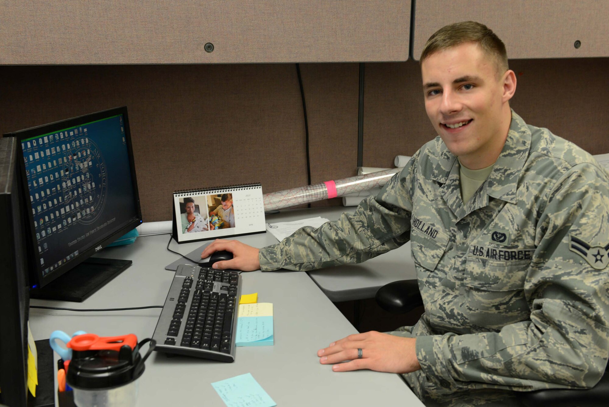 Airman 1st Class Ryan Holland, 56th Civil Engineer Squadron engineering tech, surveys land, produces floor plans using AutoCAD, and maintains data consisting of infrastructure, pavements, and utilities for Luke Air Force Base.
