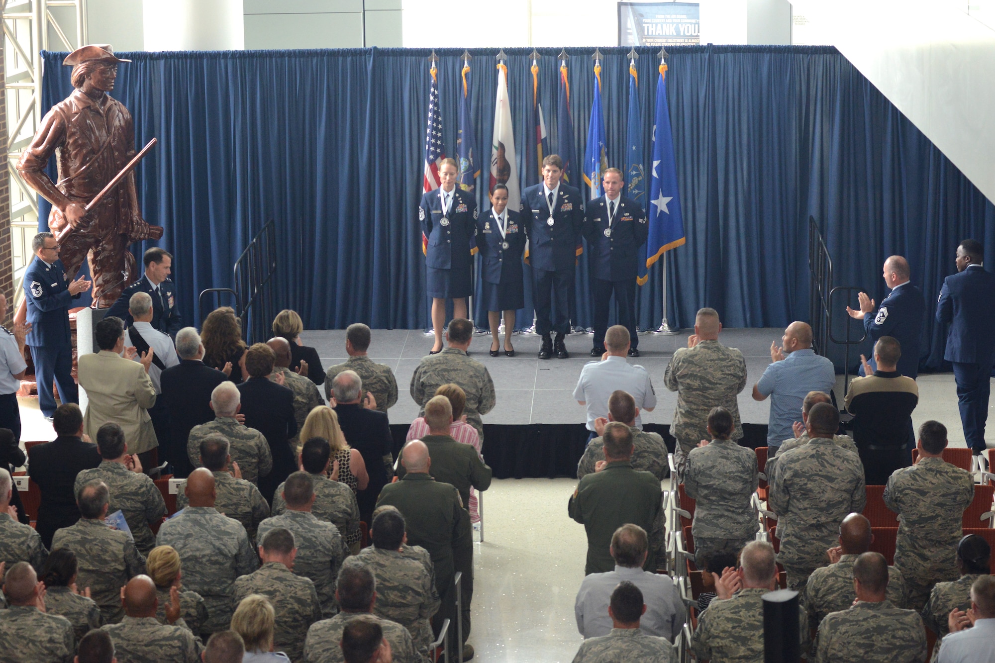 The Air National Guard's 2015 Outstanding Airmen of the Year are recognized during a director's all call at the Air National Guard Readiness Center on Joint Base Andrews, Md., August 6, 2015. The all call was part of Focus on the Force Week, a series of events highlighting the importance of professional development and recognizing the accomplishments of the enlisted force. (U.S. Air National Guard photo by Staff Sgt. John E. Hillier/released)