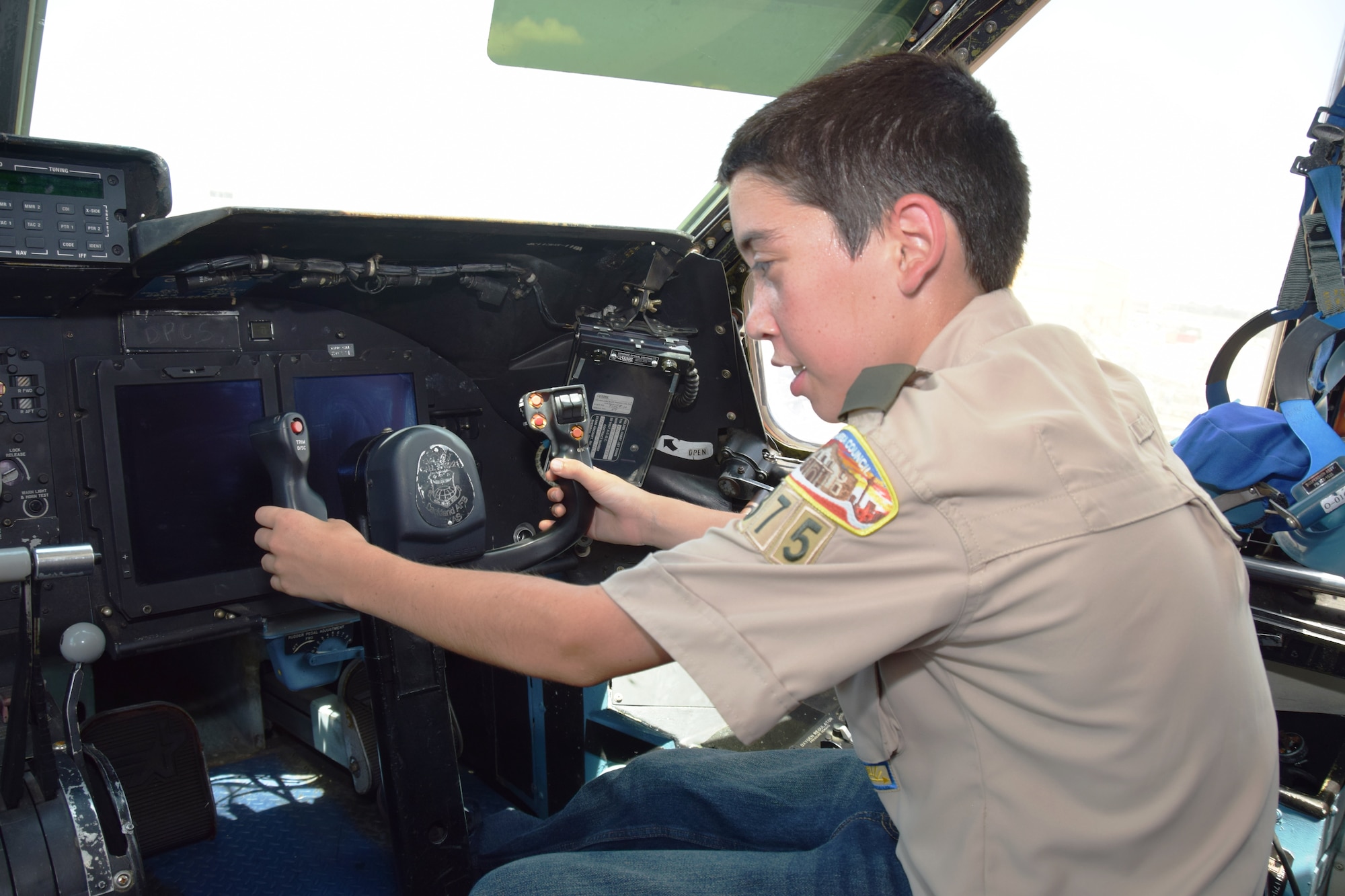 Liam Noonan, a Boy Scout from Troop 375, handles the yoke of a C-5A Galaxy on Aug. 6, 2015 at Joint Base San Antonio-Lackland, Texas.  Liam was one of 10 Scouts who were given a tour of the C-5A. (U.S. Air Force photo/Tech. Sgt. Carlos J. Trevino)