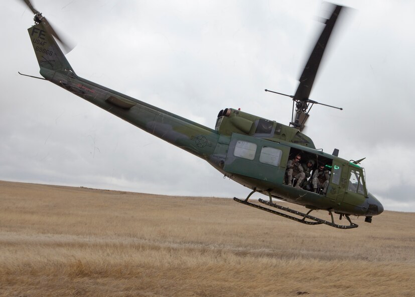 A UH-1N Huey with 37th Helicopter Squadron conducts a security patrol in the missile field East of F.E. Warren Air Force Base, April 8, 2015. Pilots of the 37th HS routinely patrol the missile field to maintain a security presence to protect our country's nuclear assets. The annual Global Strike Challenge gives 20th Air Force helicopter crews a change to show off their skills. (U.S. Air Force photo by Lan Kim)