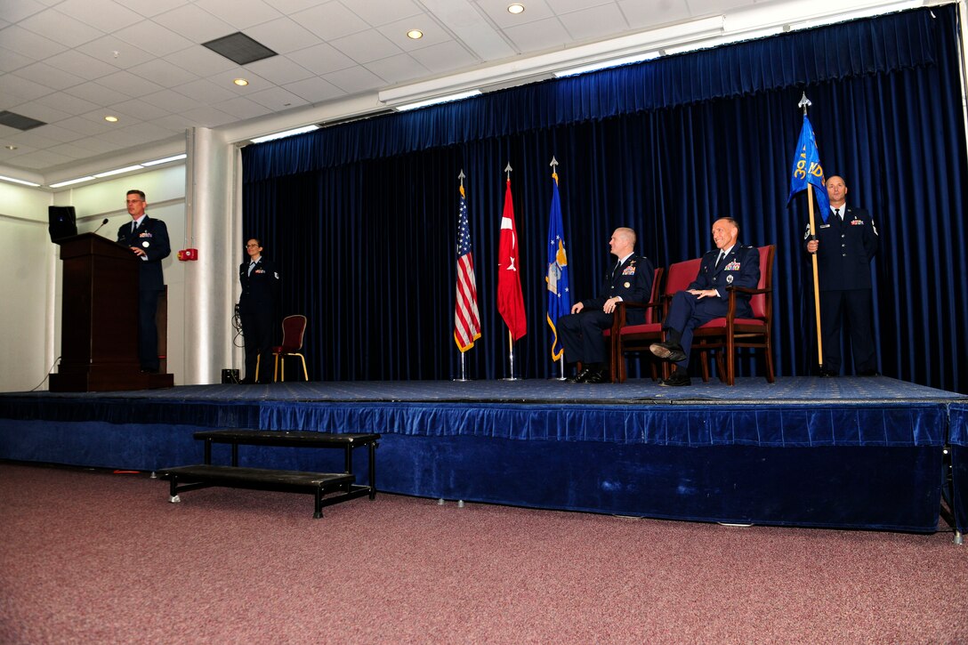 Col. Thomas Bacon, 39th Medical Group commander, speaks to those in attendance after taking command during the 39th MDG change of command ceremony Aug. 7, 2015, at Incirlik Air Base, Turkey. Prior to taking command, Bacon was the commander of the 99th Medical Operations Squadron, Nellis Air Force Base, Nev. (U.S. Air Force photo by Senior Airman Krystal Ardrey/Released)