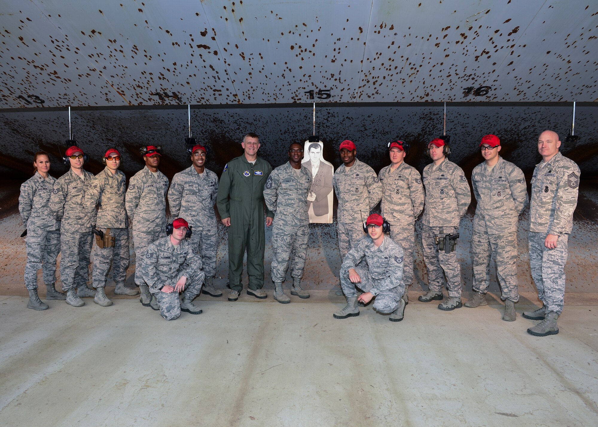 Gen. Frank Gorenc, U.S. Air Forces in Europe and Air Forces Africa commander, and Chief Master Sgt. James Davis USAFE -AFAFRICA command chief, stand with 48th Security Forces Squadron combat arms instructors at Royal Air Force Feltwell, England, Aug. 4, 2015. Gorenc and Davis met with Airmen and fired the M-5 rifle during their visit. (U.S. Air Force photo by Senior Airman Nigel Sandridge/Released)
