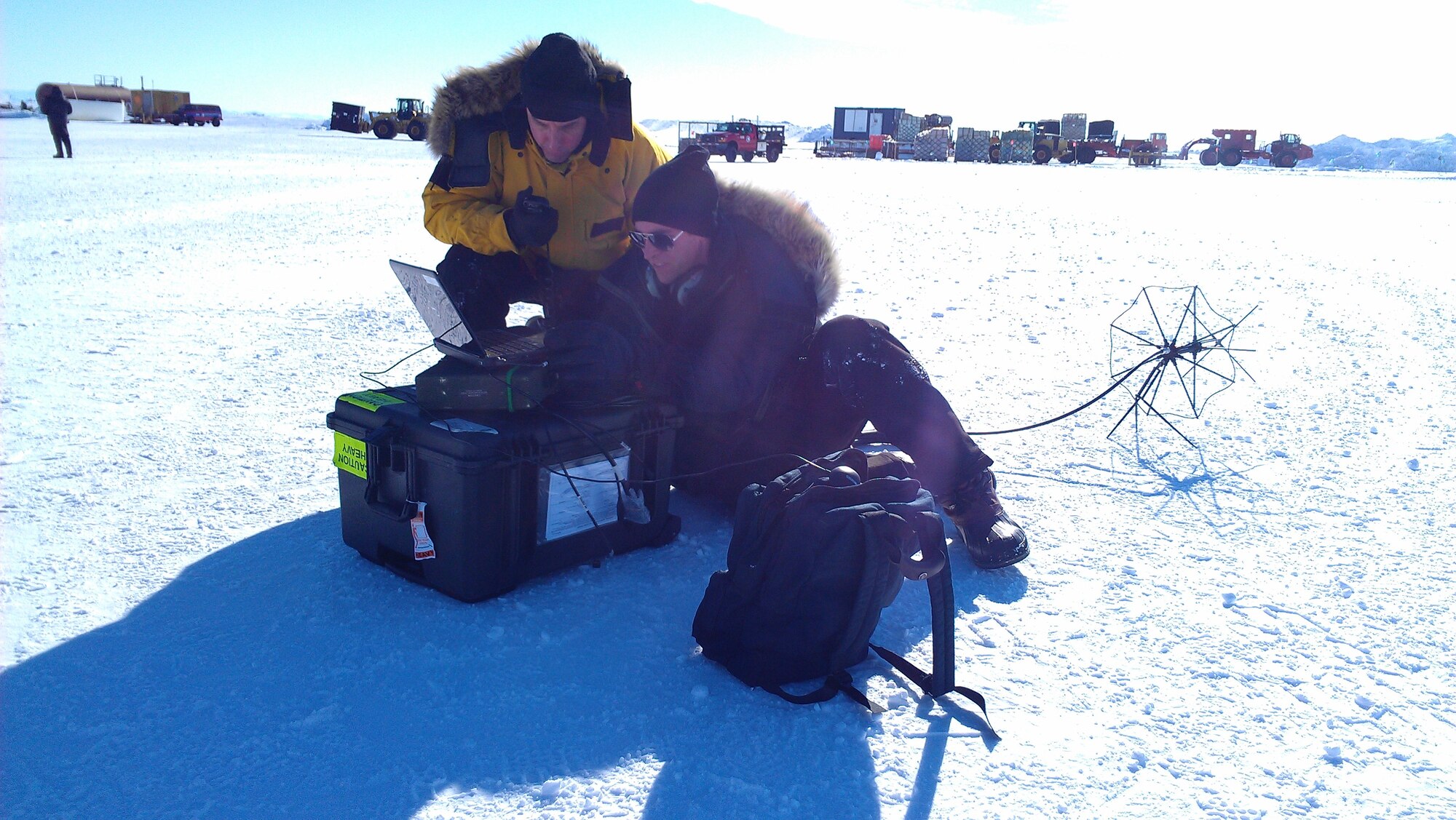 Members of an Air Force, Navy and Lockheed Martin team test a satellite communications system in Antarctica. The system is designed to provide communication capabilities in remote areas. (Air Force photo)