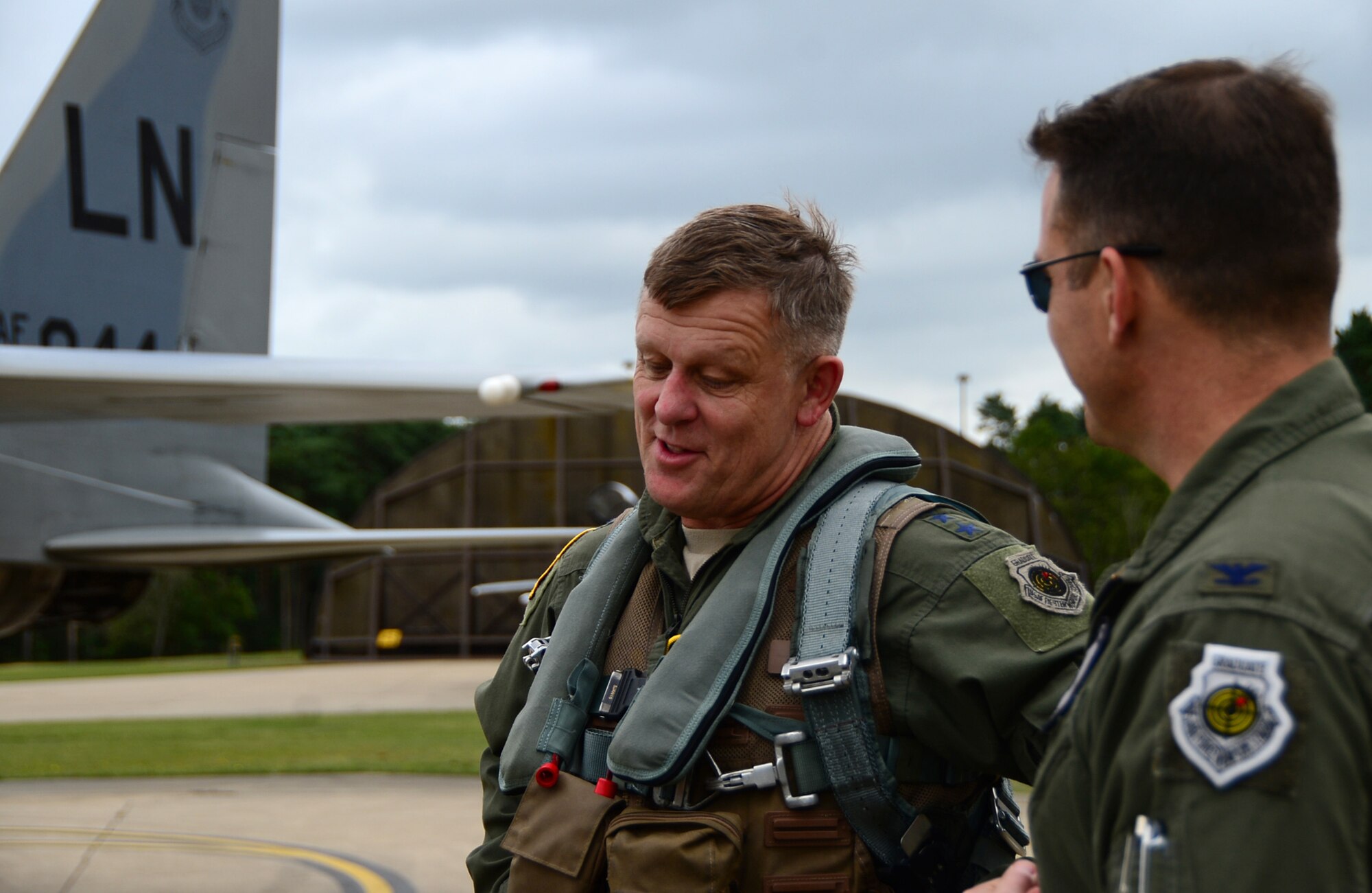 Gen. Frank Gorenc, U.S. Air Forces in Europe and Air Forces Africa commander, speaks with Col. Robert Novotny, 48th Fighter Wing commander, after flying with the 493rd Fighter Squadron at Royal Air Force Lakenheath, England, Aug. 6, 2015. Gorenc visited units across the wing to discuss key Air Force topics and recognize exceptional Airmen. (U.S. Air Force photo by Senior Airman Erin O’Shea/Released) 