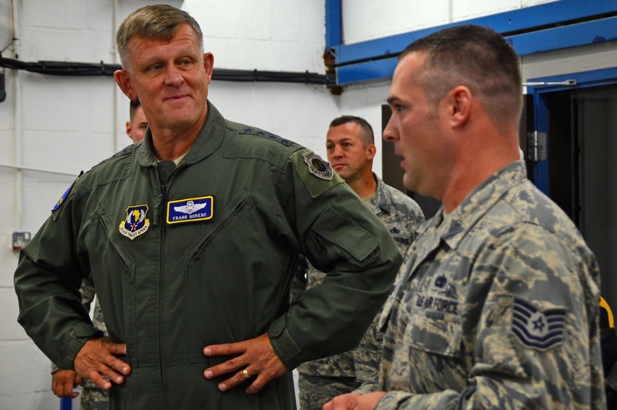 Gen. Frank Gorenc, U.S. Air Forces in Europe and Air Forces Africa commander, speaks with Airmen from the 48th Component Maintenance Squadron egress section during a distinguished guest visit at Royal Air Force Lakenheath, England, Aug. 4, 2015. Gorenc recognized exceptional Airmen and discussed key Air Force topics. (U.S. Air Force photo by Senior Airman Erin O’Shea/Released)