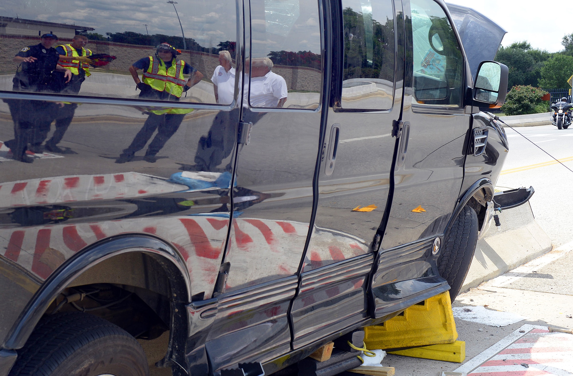 First responders from the 78th Air Base Wing answer to a major accident scene near Robins’ main gate on Watson Blvd. The accident involving only one vehicle occurred in the early afternoon on July 16. The 78th Security Forces Squadron responds to all major vehicle accidents on base. The 78th Civil Engineering Group Fire Department responds to major vehicle accidents involving injuries or fluids leaking from a vehicle.  (U.S. Air Force photo by Tommie Horton)