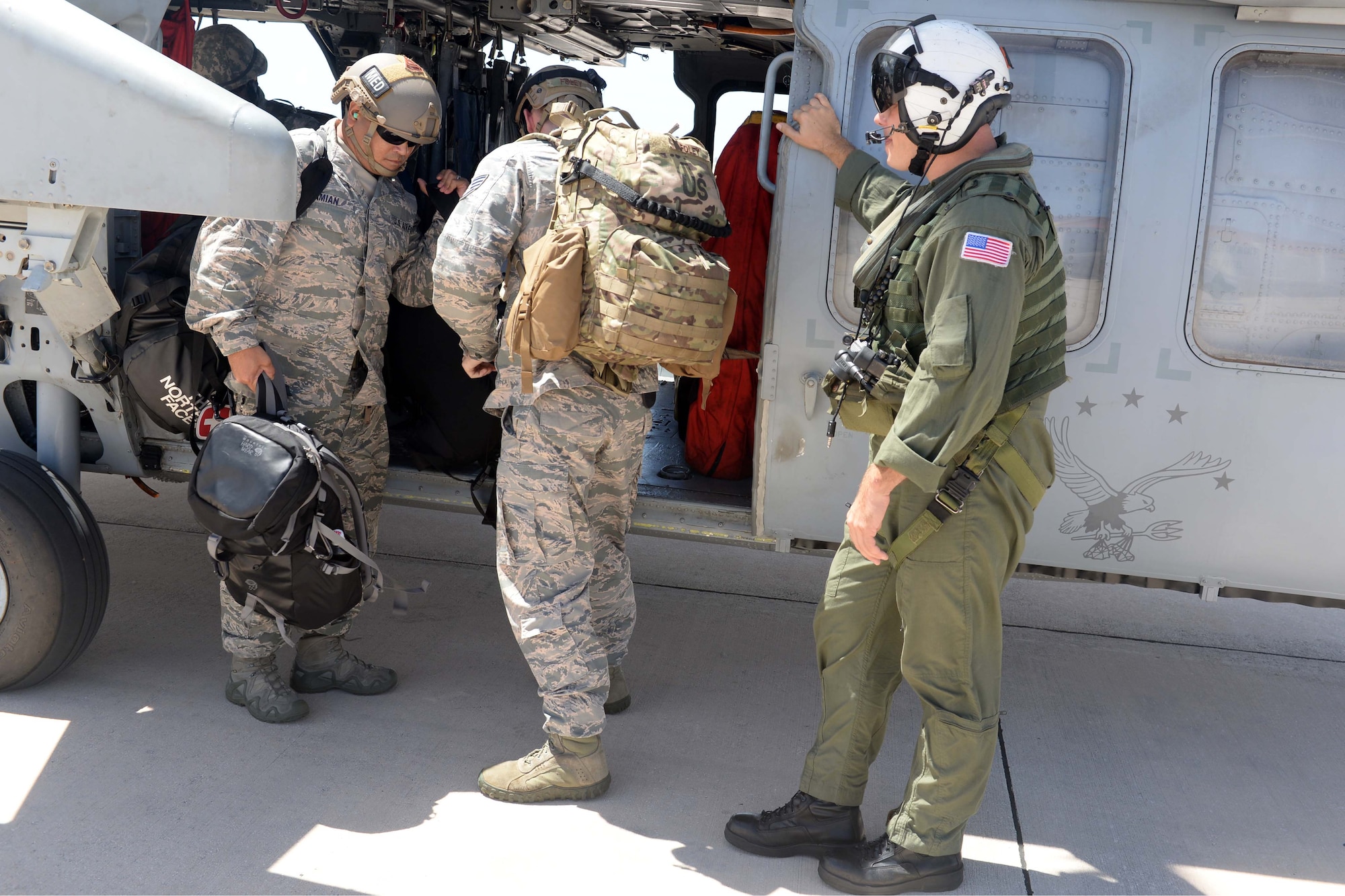 Airmen from the 36th Contingency Response Group landed on the island of Saipan Aug. 9, 2015. The 48 square mile island was battered by Typhoon Soudelor Aug. 2, as the powerful storm made its way across the Pacific. The 36th CRG Airmen deployed from Andersen Air Force Base, Guam, to assist in storm recovery efforts. Numerous agencies are contributing to the relief effort including service members from the USS Ashland, Helicopter Sea Combat Squadron Two Five and Marine Medium Tiltrotor Squadron 265 (Reinforced), 31st Marine Expeditionary Unit. (U.S. Air Force photo by Senior Airman Joshua Smoot/Released)
